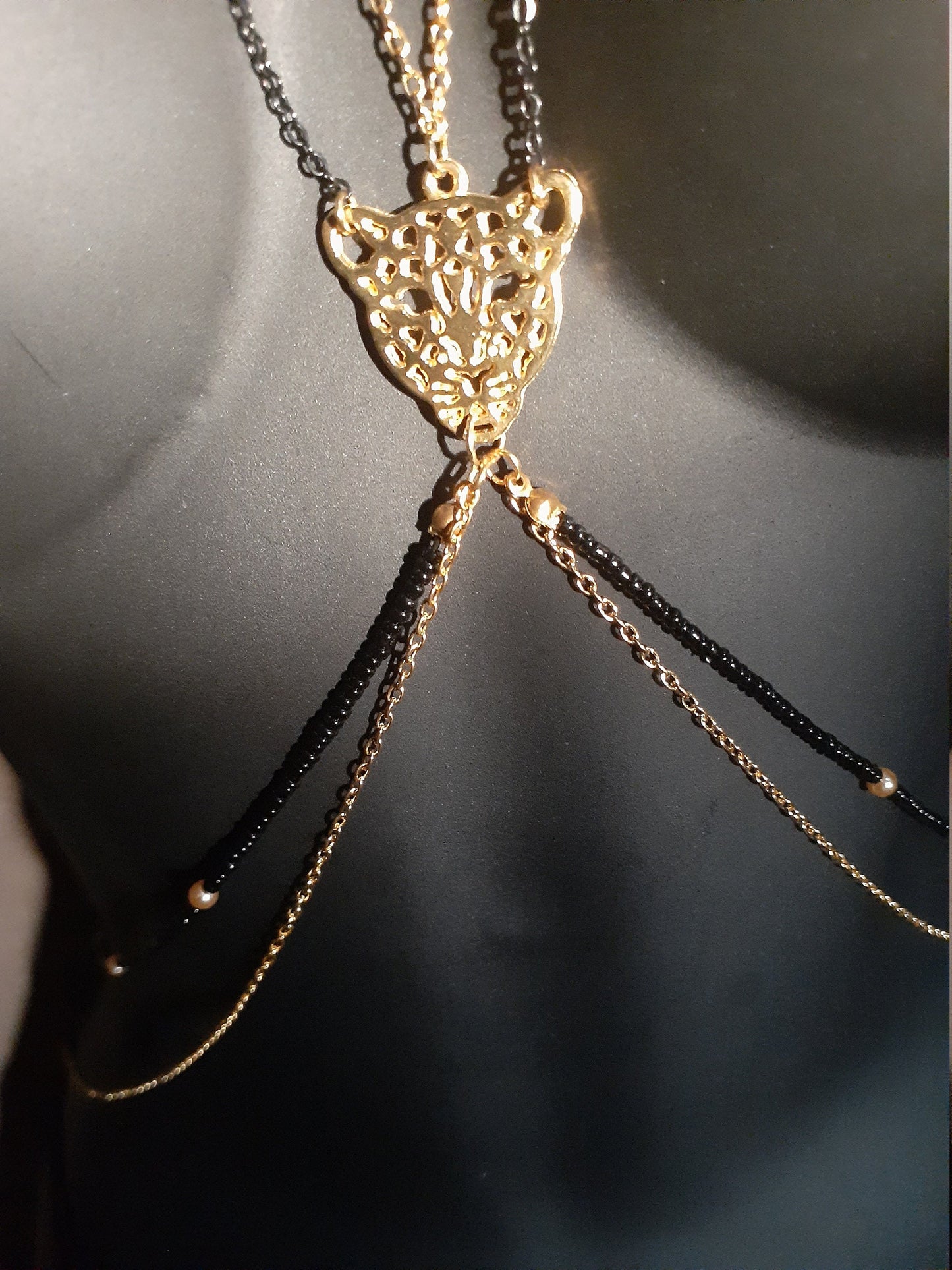 Black and gold beaded later jaguar body chain