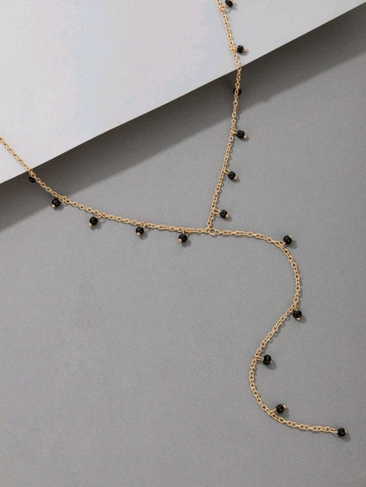 Minimalist beaded gold necklace