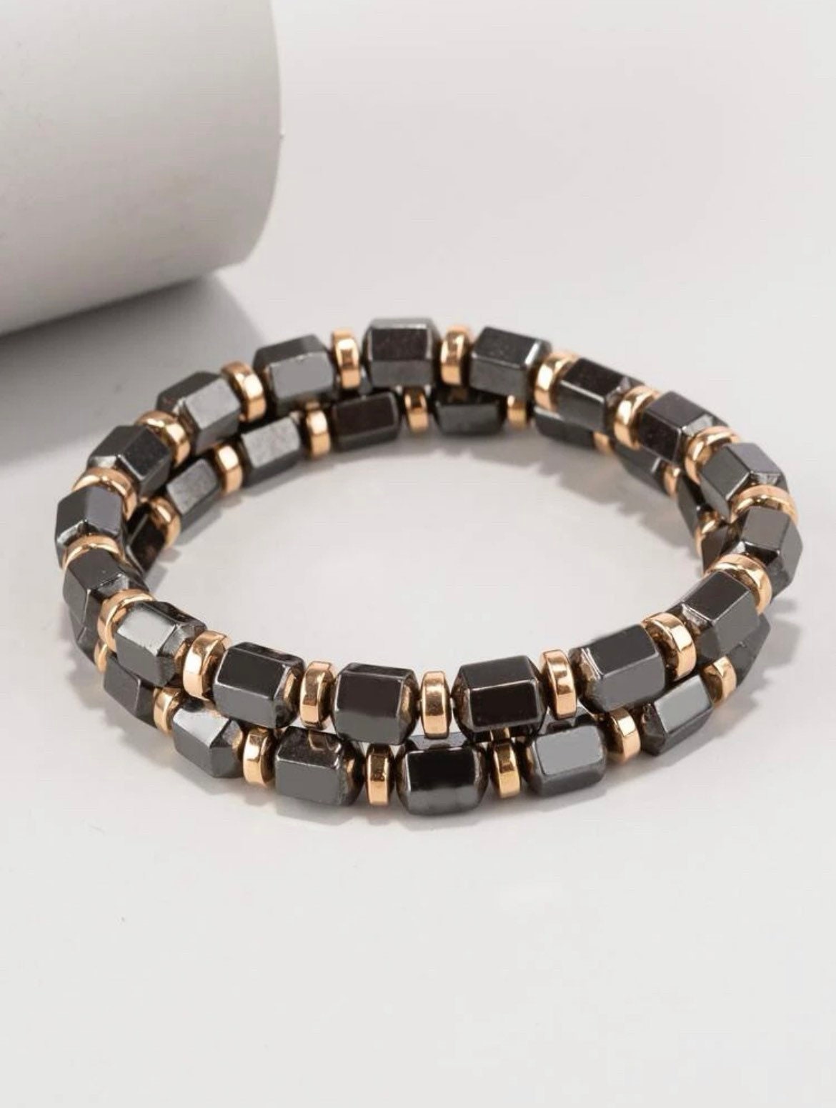 Stylish mens bracelet set. Gunmetal beaded bracelets with gold.