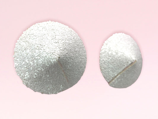 White glitter stiletto shaped pasties. Reusable