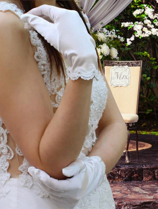 Scallop lace trim with rhinestone embellishments. Wedding accessory gloves for women