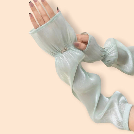 Rhinestone embroidered mesh arm sleeve. Reads love.