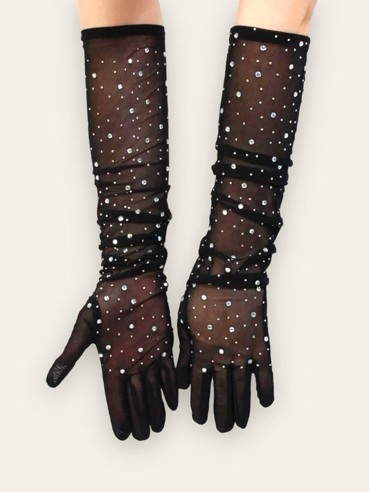 Long see through black gloves. Elbow length