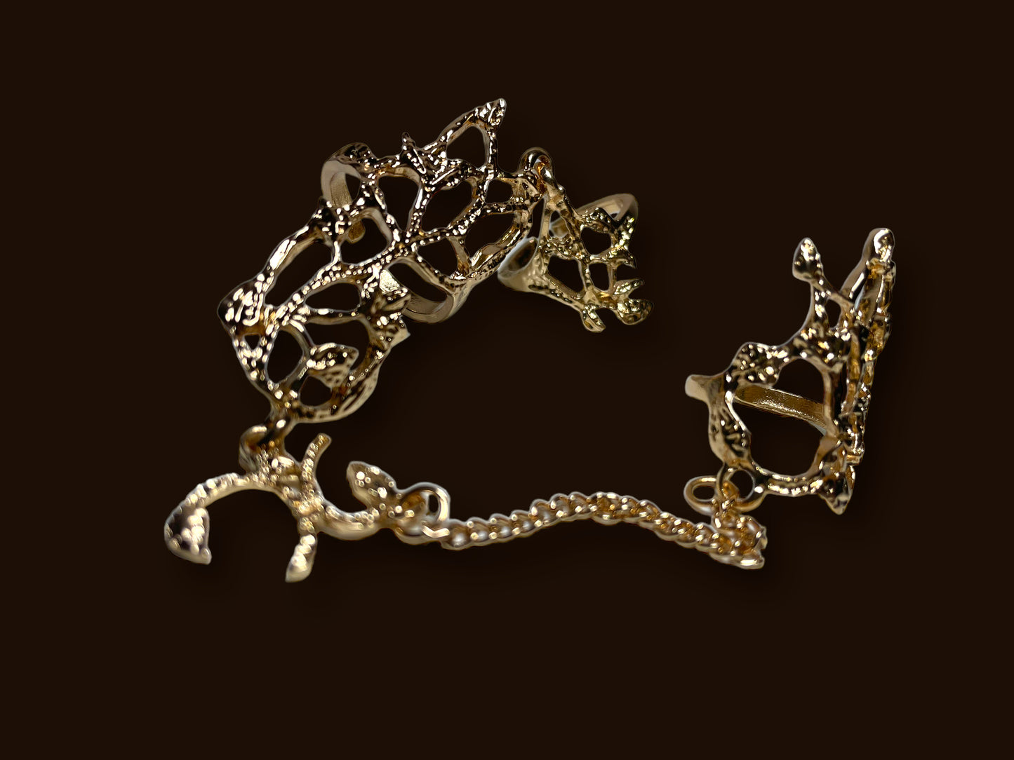 Gold floral design chain rings