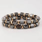Gold and gunmetal mens beaded bracelet set. 