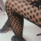 Polka dot pattern fishnet tights