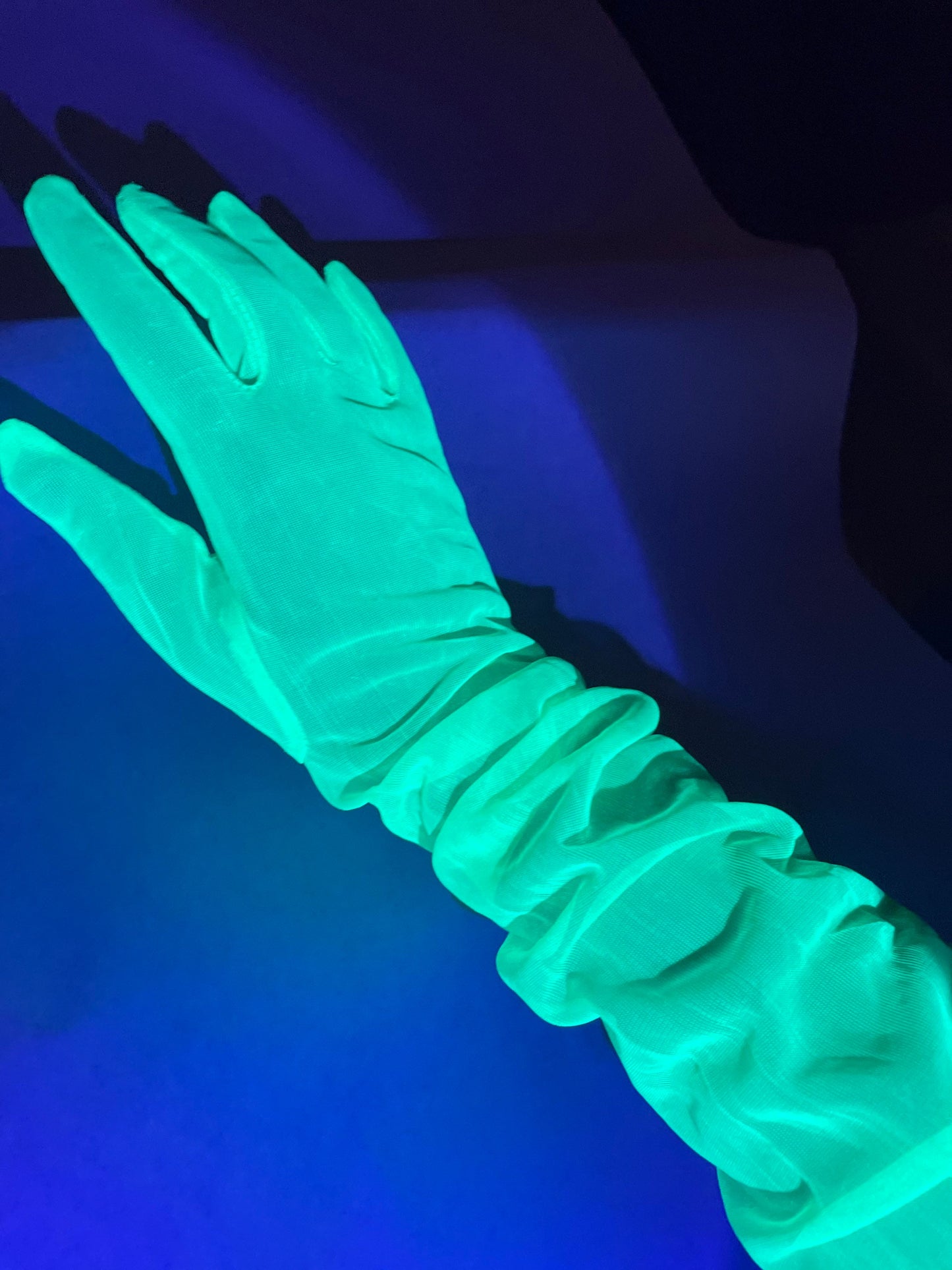 UV reactive glow in the dark gloves for raves, festivals, parties, costumes, etc. 