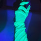 Neon green UV reactive glow in the dark fluorescent gloves.
