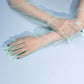 Above the elbow  green sheer gloves