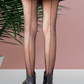 Black seam fishnet tights